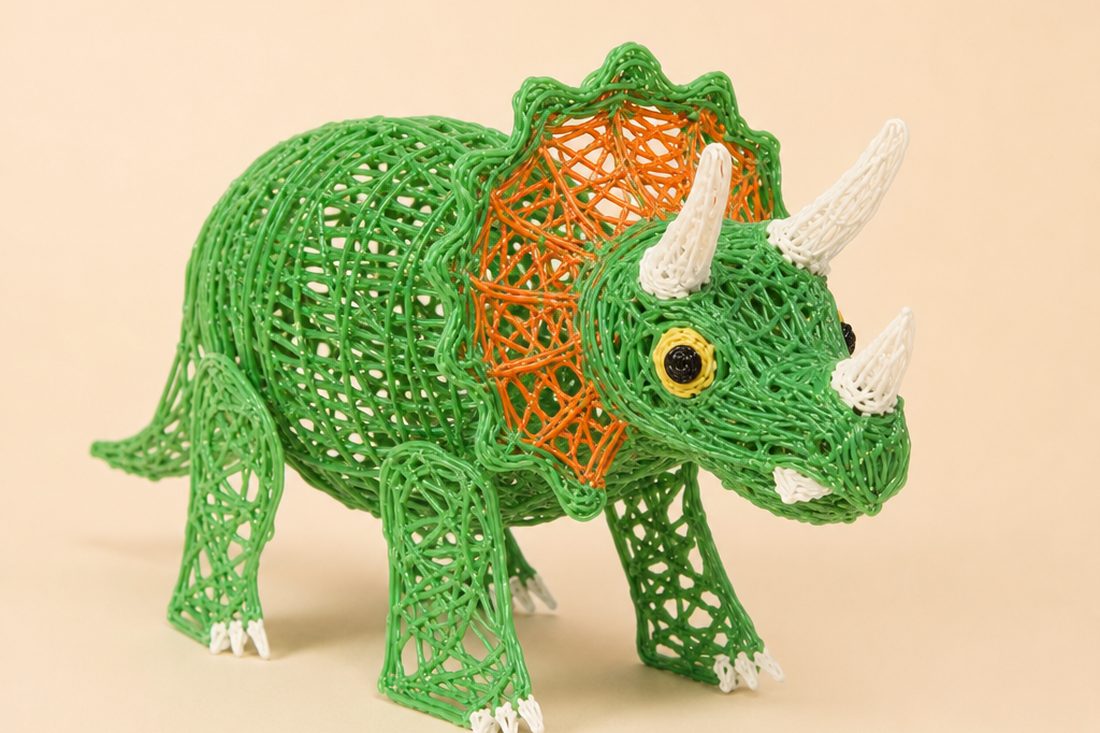 A green triceratops made with a 3D pen